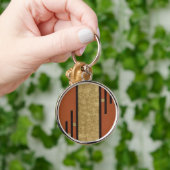 Porte-clés Art Déco en or et beige (Main)