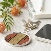 Porte-clés Art Déco en or et beige (Côté)
