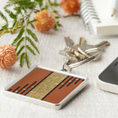 Porte-clés Art Déco en or et beige (Côté)