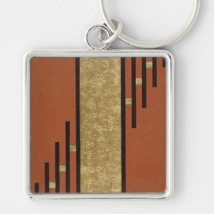 Porte-clés Art Déco en or et beige
