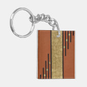 Porte-clés Art Déco en or et beige (Devant gauche)