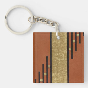 Porte-clés Art Déco en or et beige