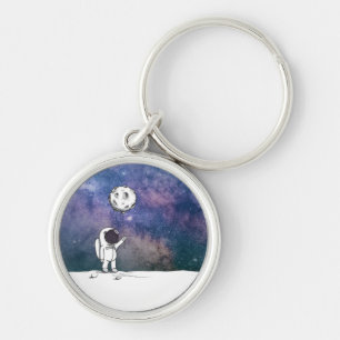 Porte-clés Astronaute dans l'espace avec ballon lunaire cosmo
