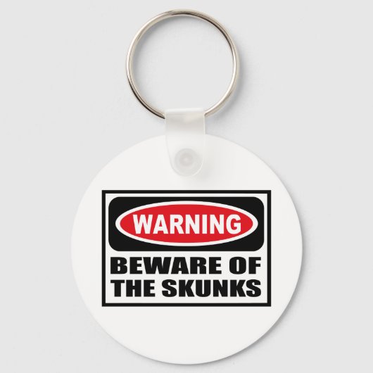 PORTE-CLÉS ATTENTION DU PORTE - CLÉ SKUNKS (Recto)