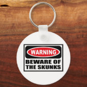 PORTE-CLÉS ATTENTION DU PORTE - CLÉ SKUNKS (Recto)