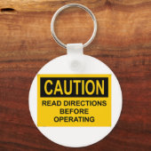 Porte-clés ATTENTION Lire les instructions avant de fonctionn (Recto)