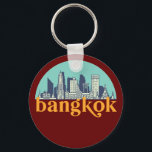 Porte-clés Bangkok Thaïlande Vintage Skyline Ville<br><div class="desc">Design urbain vintage et rétro avec une belle skyline, attraction touristique et art urbain. gratte-ciel Cool et silhouette de construction merchandises pour touristes et voyageurs. Parfait comme souvenir à rapporter lors d'un voyage dans le monde. Enregistrez la mémoire de votre voyage et de vos vacances en famille et entre amis....</div>