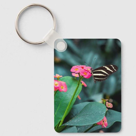 Porte-clés Beau papillon sur une fleur rose (Recto)