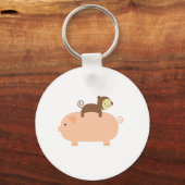 Porte-clés Bébé singe équitation sur un cochon (Recto)