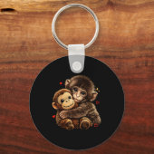 Porte-clés Bébé singe mignon serrant une peluche ours poupée  (Recto)