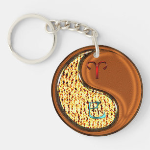 Porte-clés Béliers et serpent à bois
