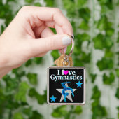 PORTE-CLÉS BELLE CONCEPTION DE GYMNASTIQUE BLEU ET ARGENT (main)