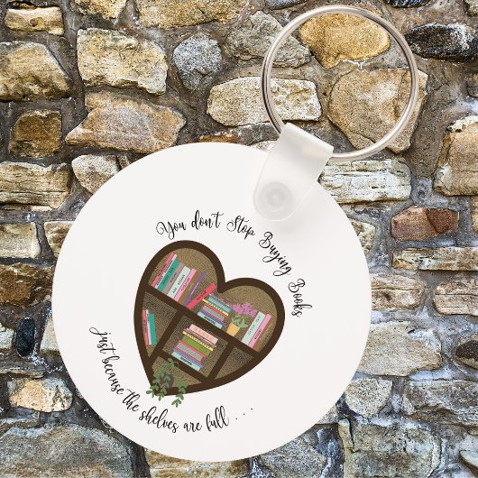 Porte-clés Bibliothèque de coeur "N'arrêtez pas d'acheter des