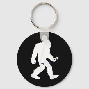 Porte-clés Bigfoot Badminton Player Sasquatch Shuttle