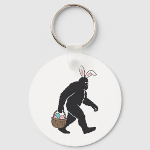 Porte-clés Bigfoot Sasquatch Bunny Oreilles transportant OEuf