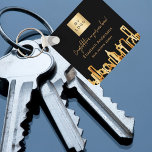 Porte-clés Black gold city skyline real estate agent logo<br><div class="desc">A black background,  with a faux gold city skyline as decor. Personalize and add your business logo and a text on front. Golden letters</div>