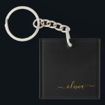 Porte-clés Black Gold Modern Script Girl Monogramme Nom<br><div class="desc">Noir et or Simple Script Monogramme Nom Porte - clé. Cela rend le cadeau parfait pour 16 ans,  mariage,  douche nuptiale,  anniversaire,  baby shower ou bachelorette pour quelqu'un qui aime le luxe glam et les styles chic.</div>