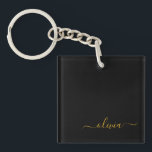 Porte-clés Black Gold Modern Script Girl Monogramme Nom<br><div class="desc">Noir et or Simple Script Monogramme Nom Porte - clé. Cela rend le cadeau parfait pour 16 ans,  mariage,  douche nuptiale,  anniversaire,  baby shower ou bachelorette pour quelqu'un qui aime le luxe glam et les styles chic.</div>
