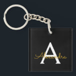 Porte-clés Black Gold Modern Script Girl Monogramme Nom<br><div class="desc">Noir et or Simple Script Monogramme Nom Porte - clé. Cela rend le cadeau parfait pour 16 ans,  mariage,  douche nuptiale,  anniversaire,  baby shower ou bachelorette pour quelqu'un qui aime le luxe glam et les styles chic.</div>