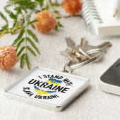 PORTE-CLÉS BLEU & JAUNE JE ME TIRE AVEC L'UKRAINE (Côté)