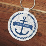 Porte-clés  Blue anchor rope border boat name keys driftwood<br><div class="desc">Keychain for your boat keys featuring a dark blue nautical anchor surrounded by a rope border on a light gray driftwood background. Across the anchor is a blue ribbon with a template field for your boat's name. Dark blue back.</div>