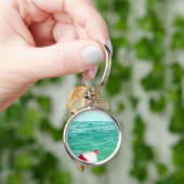 Porte-clés Bobeur de pêche dans l'eau (main)