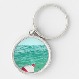 Porte-clés Bobeur de pêche dans l'eau