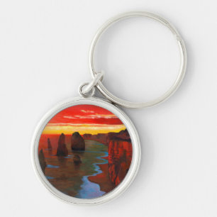 Porte-clés Bord de la mer rocheux au coucher du soleil