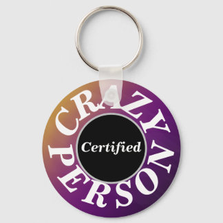 Porte-clés bouton de personne folle violet