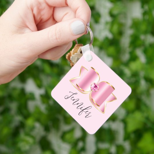 Porte-clés Bow en verre rose avec pierre centrale (main)