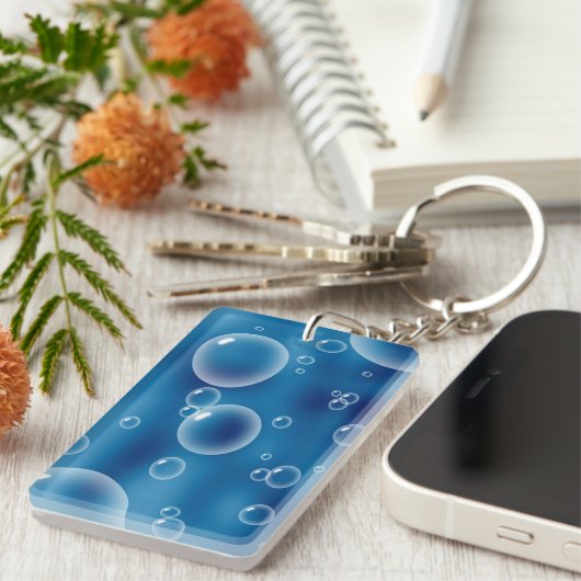 Porte-clés Bulles sur l'arrière - plan bleu-foncé (Devant droit)