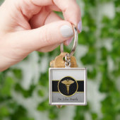 Porte-clés Caducée Médicale d'or - porte - clé (main)