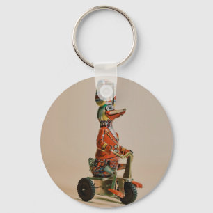 Porte-clés Canard en jouet vintage à vélo