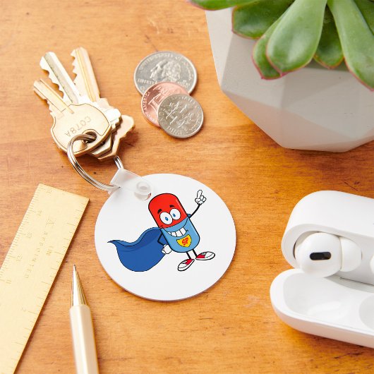 Porte-clés Capsule de pilule de dessin animé