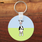 Porte-clés Caricature de vache noire et blanche. Devant. (Recto)