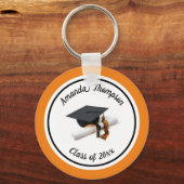 Porte-clés Casquette noire et orange et Tassel (Recto)