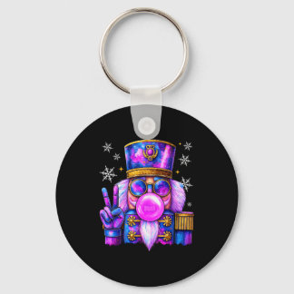 Porte-clés Casse-noisette violet soufflant du bubble gum Noël