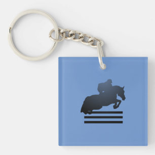 Porte-clés  Cavalier franchissant un obstacle.  