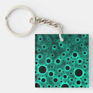 Porte-clés Cercles noirs sur fond turquoise