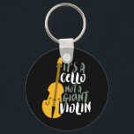Porte-clés C'est un violon pas géant violon drôle musicien<br><div class="desc">Conception vintage d'orchestre de musique rétro pour ceux qui jouent de l'instrument de musique à cordes dans un groupe de musique ou symphonie. Amateur de musique classique cool marchandise pour violoncelliste, musicien et artiste. Parfait pour les professeurs de violoncelle, les fans d'orchestre et ceux qui aiment jouer du violoncelle ou...</div>