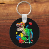 Porte-clés Cette sensibilisation sur l'autisme de dinosaures  (Recto)