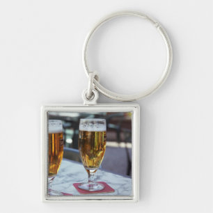 Porte-clés Chablis; deux bières cool à 42 degrés chauds é