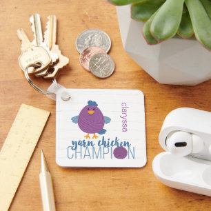 Porte-clés Champion de poule pourpre et bleu