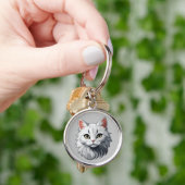 Porte-clés Charmant chat blanc (main)