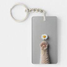 chat à main mignon avec fleur