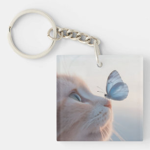 Porte-clés Chat adorable et papillon bleu