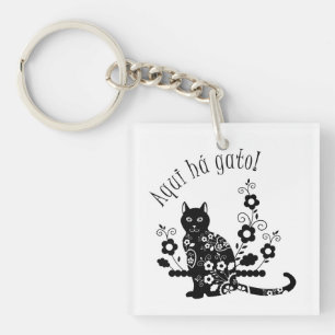 Porte-clés Chat noir avec fleurs et expression portugaise