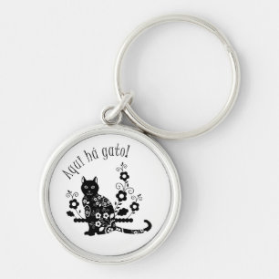 Porte-clés Chat noir avec fleurs et expression portugaise