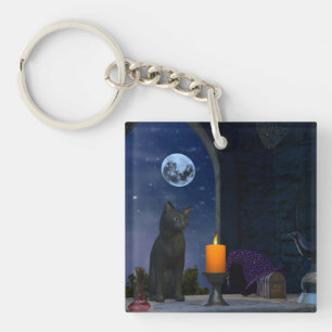 Porte-clés Chat noir mignon à la chandelle