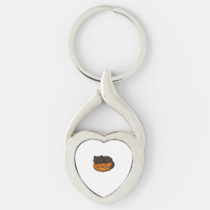 Porte-clés Chat noir mignon et dormant sur un Essen d'Hallowe